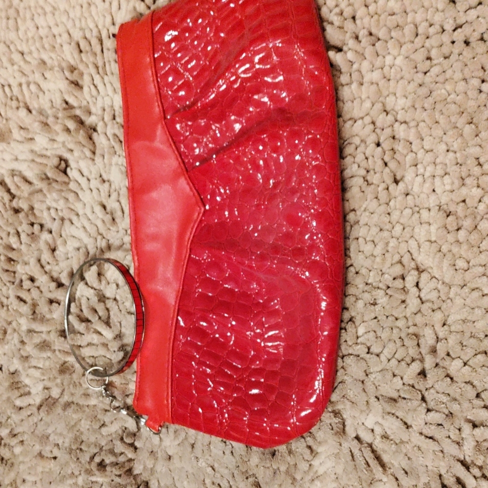 Red purse with bracelet carrier